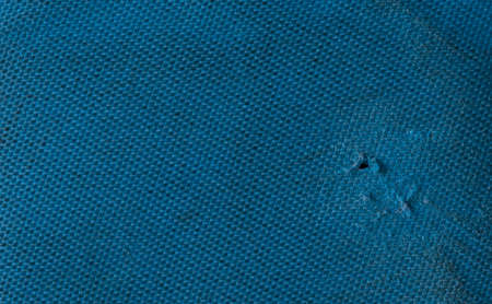 Macro image of the worn blue nylon fabricの写真素材