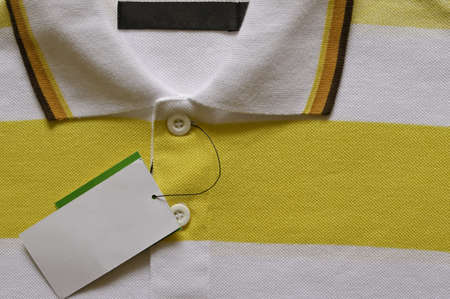 Blank price tag hang over Polo T-shirt の写真素材