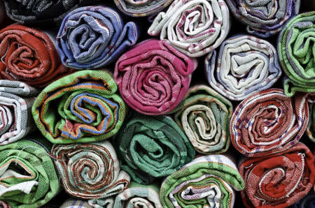 Pile of colorful cotton towelsの写真素材