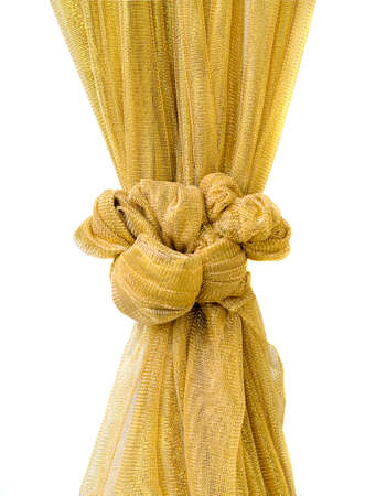 Art of golden fabric tied for enrichment on white backgroundの写真素材