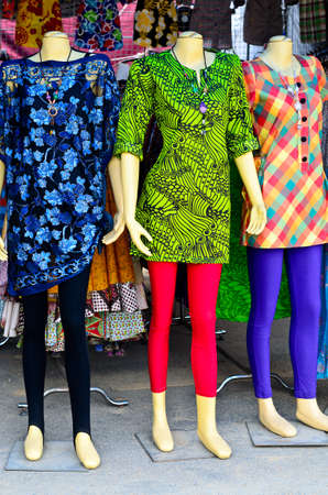 Colorful fashion dress on female mannequinsの写真素材