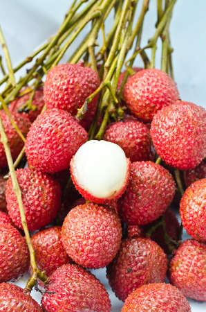 fresh lychees on white backgroundの写真素材
