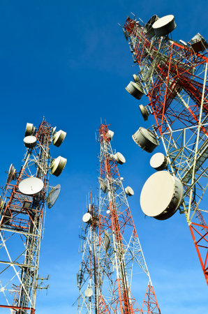 Communication towers with blue sky