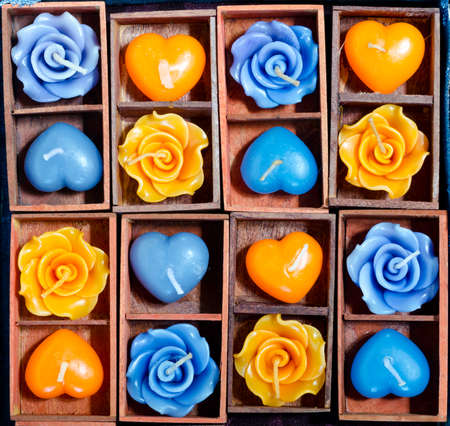 candle roses and candle hearts in wooden boxの写真素材