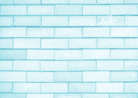 Light blue brick wall texture or backgroundの写真素材