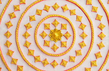 Thai Style art pattern on a wall in public templeの写真素材