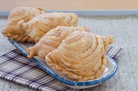 Yummy curry puff in ceramic dish