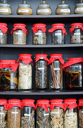 Thai herbal medicine in bottle with Thai language herbal name labelの写真素材