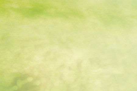 Abstract green bokeh on paper background