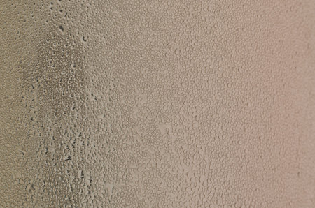 Abstract water drops on a metal backgroundの写真素材