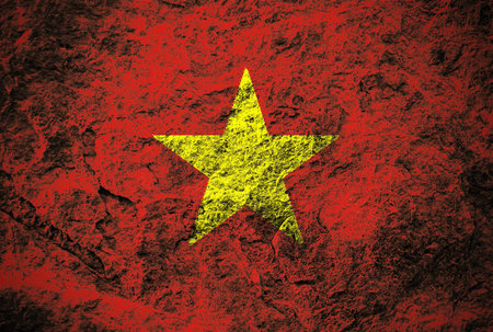Socialist Republic of Vietnam flag on grunge stone background