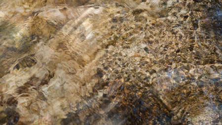 Abstract river water, wave, brown backgroundの写真素材