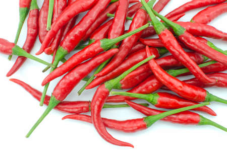 Stack of hot chili pepper or small chili padi, isolated on white backgroundの写真素材