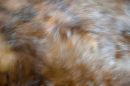 Abstract motion blur river water, wave, brown backgroundの写真素材