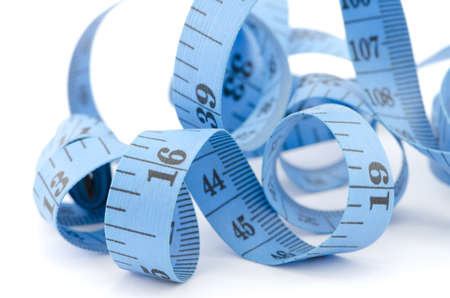 Close up of blue measuring tape for health concept, isolated on white backgroundの写真素材