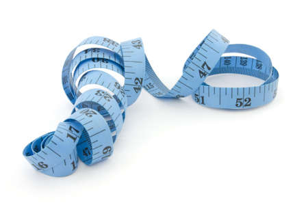 Close up of blue measuring tape for health concept, isolated on white backgroundの写真素材