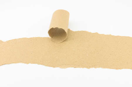 Blank brown paper roll, good for conceptual words background, web page, graphic design, catalog or texture. Isolated on white.の写真素材