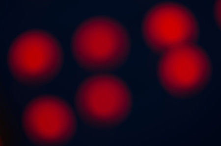 Abstract city night defocused light, blur bokeh, colorful & dark background.