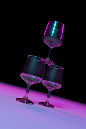Transparent glasses with color lighting background. 3D rendering.の写真素材