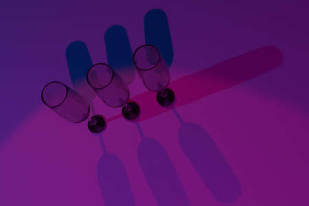 Transparent glasses with color lighting background. 3D rendering.の写真素材