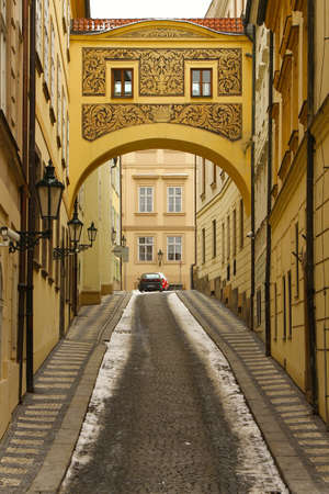 Archway over the cobble stone street in Pragueの写真素材