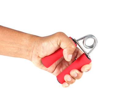 Hand trainer with steel spring in male hand isolated on whiteの写真素材