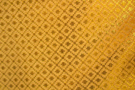 gold fabric texture backgroundの写真素材