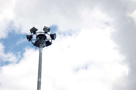 Spotlight tower with white cloudsの写真素材