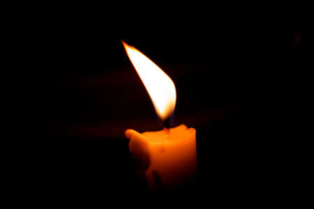 Single candle up closeの写真素材