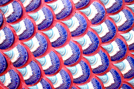 Close up seamless patterns of blue serpent scale skin in temple backgroundの写真素材