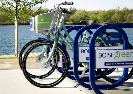 Boise, ID - April 24, 2018: Bicycles in a Boise Greenbike station along the greenbelt, part of the...