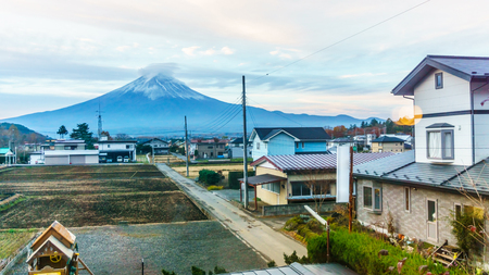 Fuji Mountain at morning in autumn view behind Kawaguchiko village, Japan.のeditorial素材