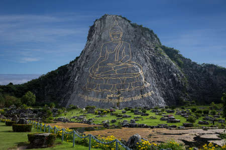 The Buddha at the cliff in thailand.の写真素材