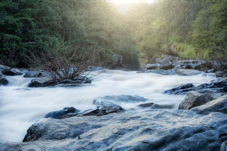 Water flows between the cliffs.の写真素材