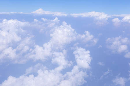 Sky and clouds in the air, good height from the top of the plane.の写真素材