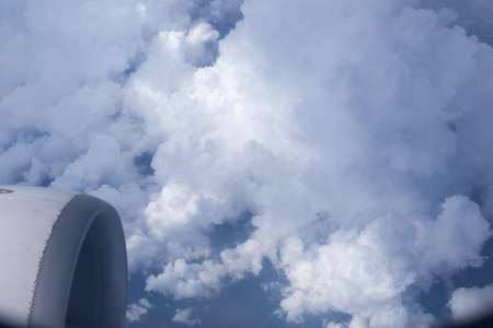 Sky and clouds in the air, good height from the top of the plane.の写真素材