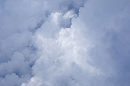 Sky and clouds in the air, good height from the top of the plane.の写真素材