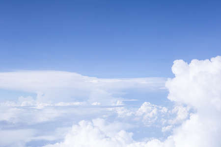 Sky and clouds in the air, good height from the top of the plane.の写真素材