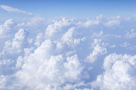 Sky and clouds in the air, good height from the top of the plane.の写真素材