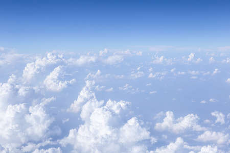 Sky and clouds in the air, good height from the top of the plane.の写真素材
