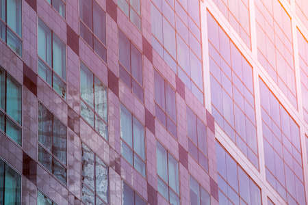 The windows of the building reflect the reflection.の写真素材