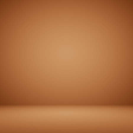 Empty Orange with Black vignette Studio well use as background.の写真素材