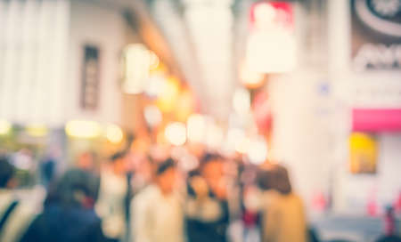 Blurred people and shopping center in Dotonbori road  in the Namba District, Osaka - Japan.の写真素材