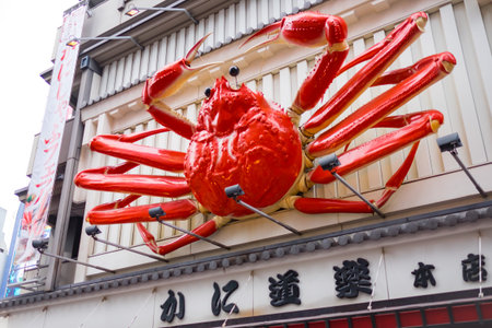 OSAKA, JAPAN - SEPTEMBER, 1: blurred Crab restaurant billboard in the Namba Districton on SEPTEMBER...