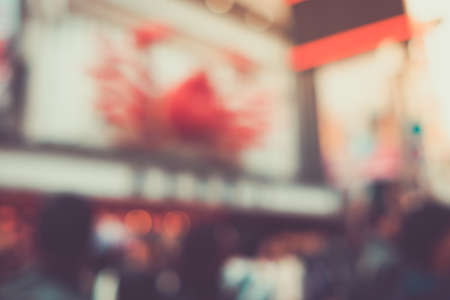 Blurred tourist with Crab restaurant in Osaka,Japan. One of the most famous restaurant in Dotonbori, Namba distract.の写真素材