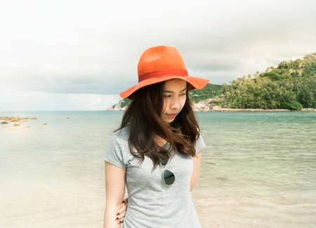 Outdoor summer portrait of young pretty asian woman. Film tone.の写真素材