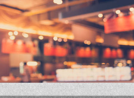 Vintage Style - blurred luxury restaurant in shopping mall with cement top tableの写真素材
