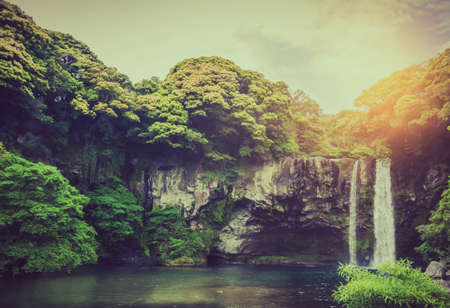 Cheonjiyeon Waterfall is a waterfall on Jeju Island, South Korea. The name Cheonjiyeon means sky. This picture well use in promoting the place for Jeju island, South Korea. Jeju is well-know island.の写真素材