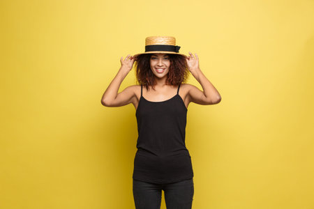 Travel concept - Close up Portrait young beautiful attractive African American woman with trendy hat...