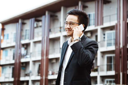 Concept Business - Business man serious talking with his projectの写真素材